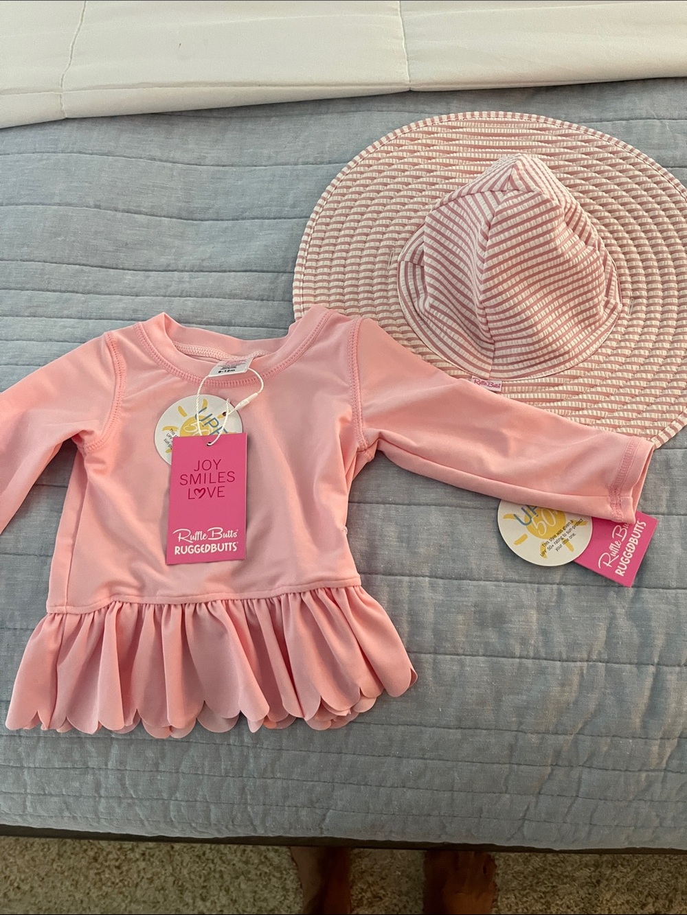Ruffle Butts Pink Long-Sleeve Girls' Swim Top with Matching Pink Sun Hat
